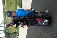 KidWithGolfBagSM